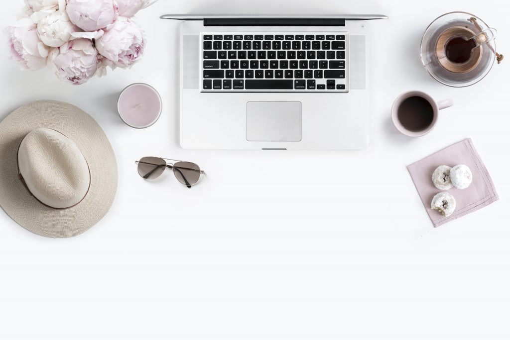 Laptop and coffee on a bright workspace